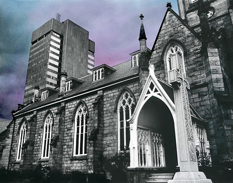 A black and white picture of an old Church in Hamilton with highrise office building in background with a handpainted blue purple sky.